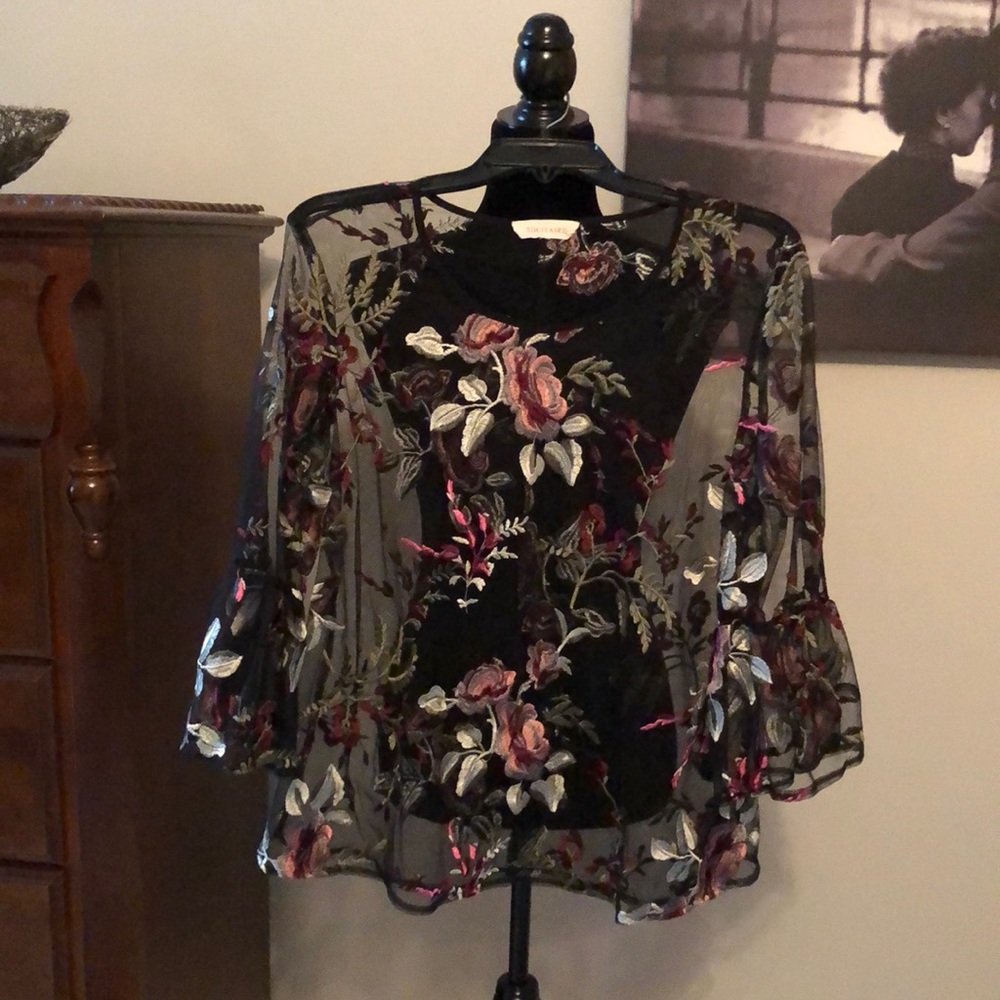 Sheer pull over top with floral design